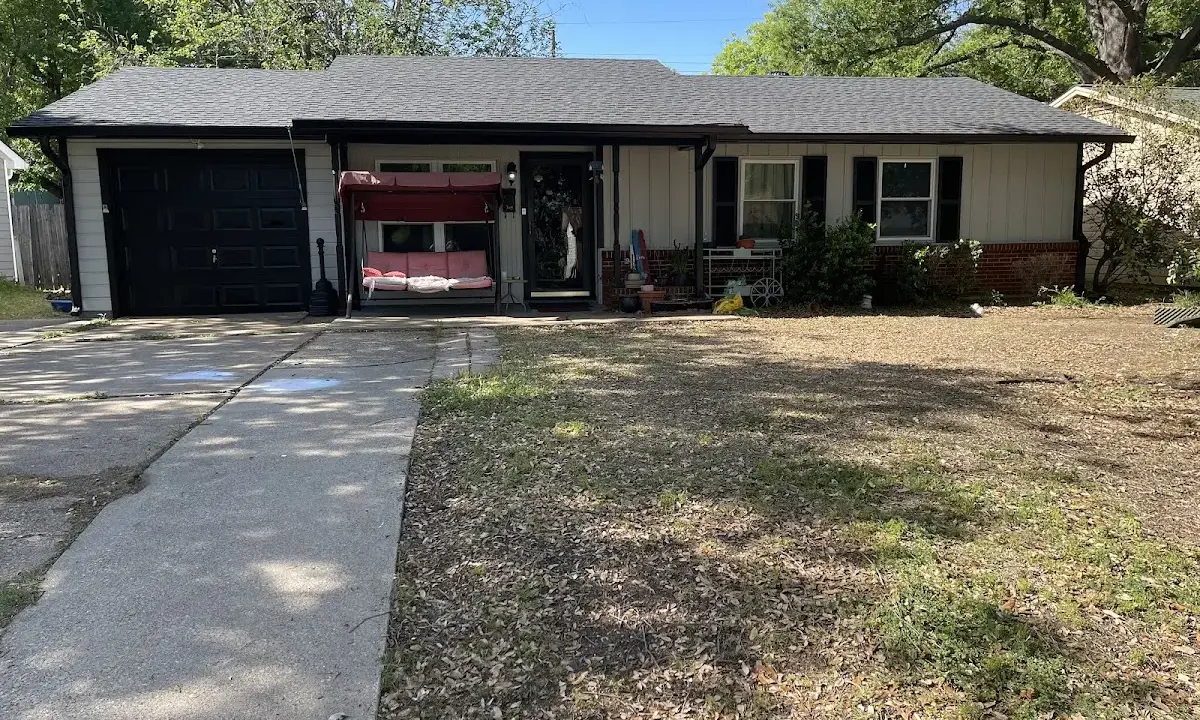 Asphalt Shingle Roof Repair crew at work on a residential roof in Mauldin